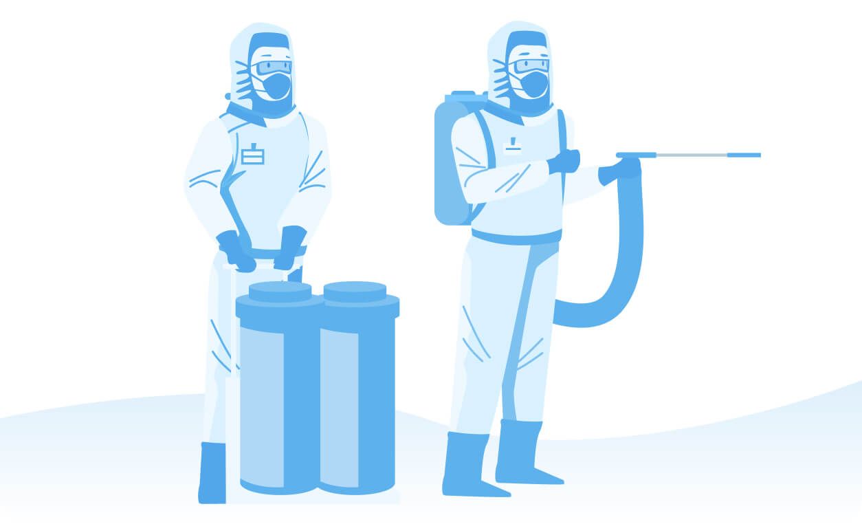 Two workers in protective gear handle cleaning supplies and equipment in a cleanroom environment.