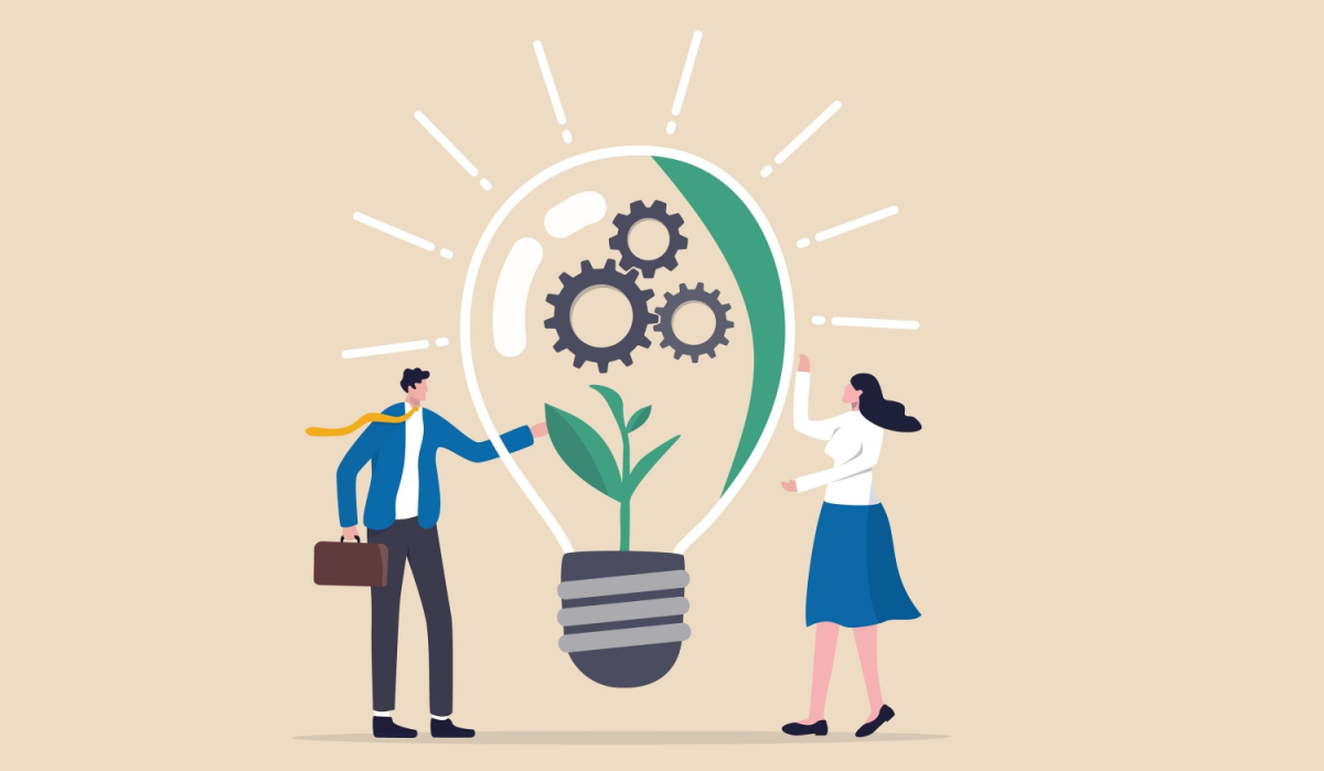 Two people discuss a lightbulb with a plant and gears inside, symbolizing innovation and sustainable ideas.